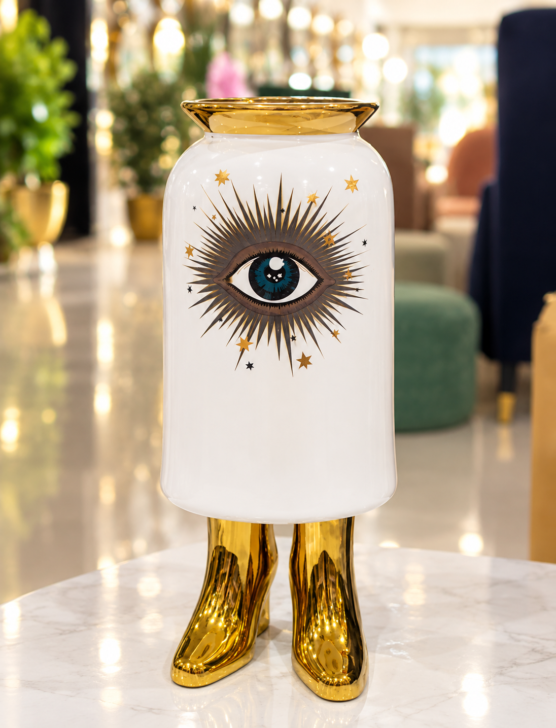 surrealist evil eye boot vase