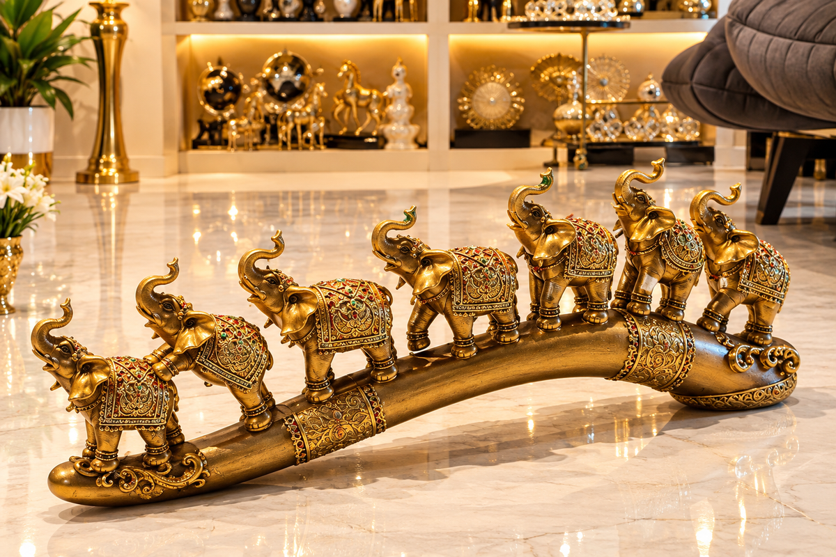golden Feng Shui sculpture of a seven-elephant family parade