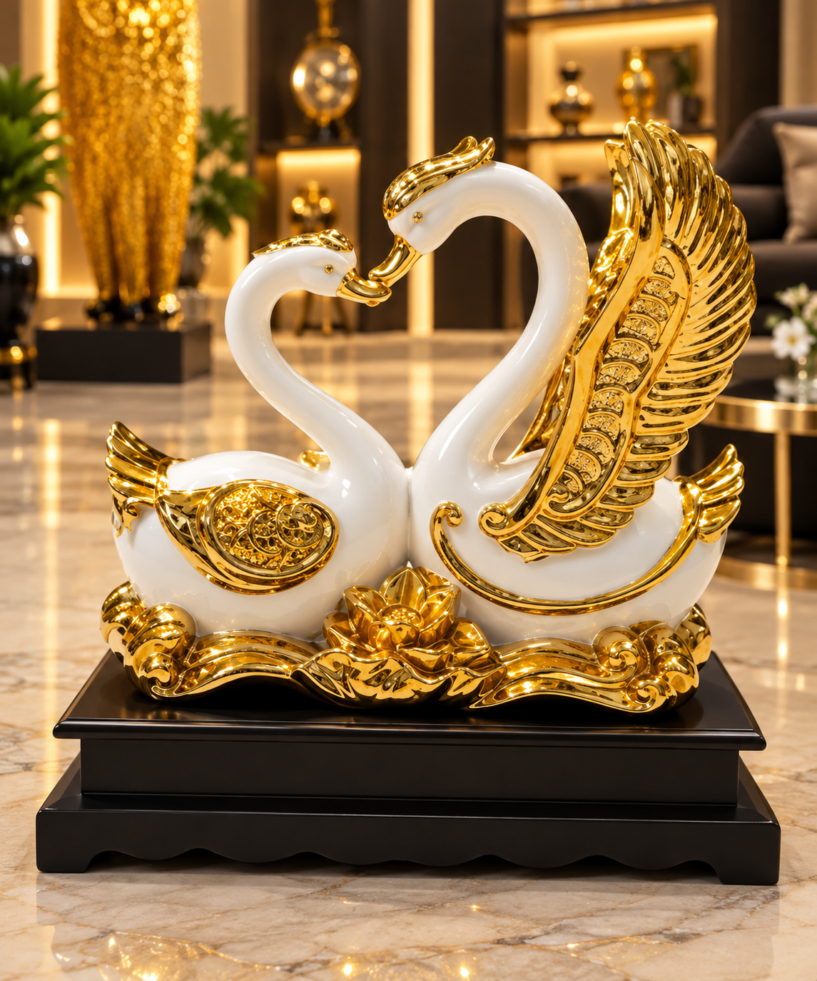 white and gold ceramic swan couple sculpture