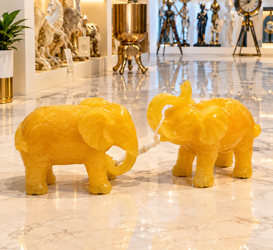 pair of matching yellow jade stone elephant statues