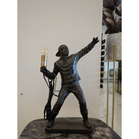 Man with lamp articles